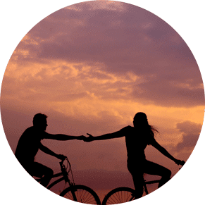 Couple riding bikes during adventure activity at MindSol Wellness Center in Sarasota, Florida