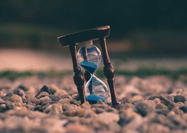 Hourglass representing out limited time used as a metaphor for grief and end-of-life issues discussed in session at MindSol Wellness Center in Sarasota, Florida